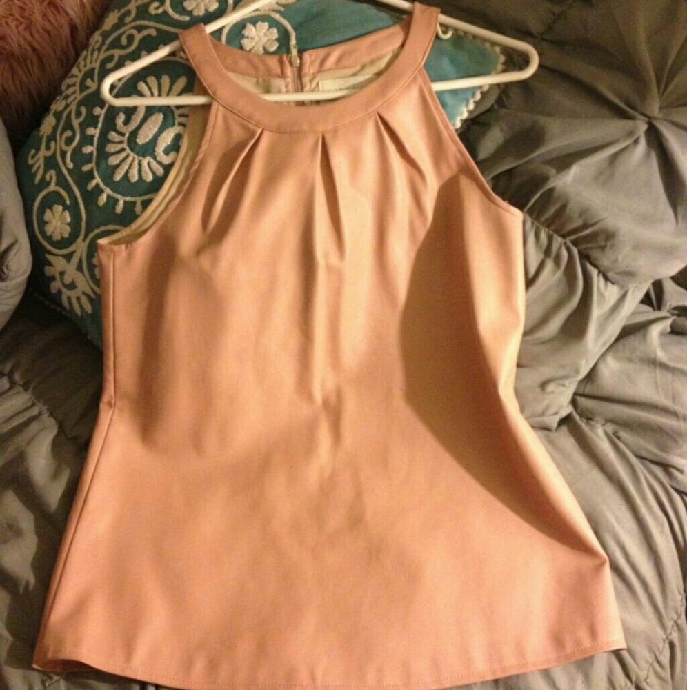 Nude/pink leather top.